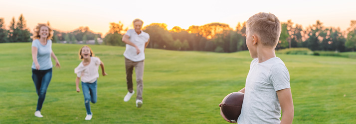 Chiropractic Virginia beach VA Family Football in Park